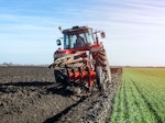 tractor-agricultural-machine-cultivating-field.jpg